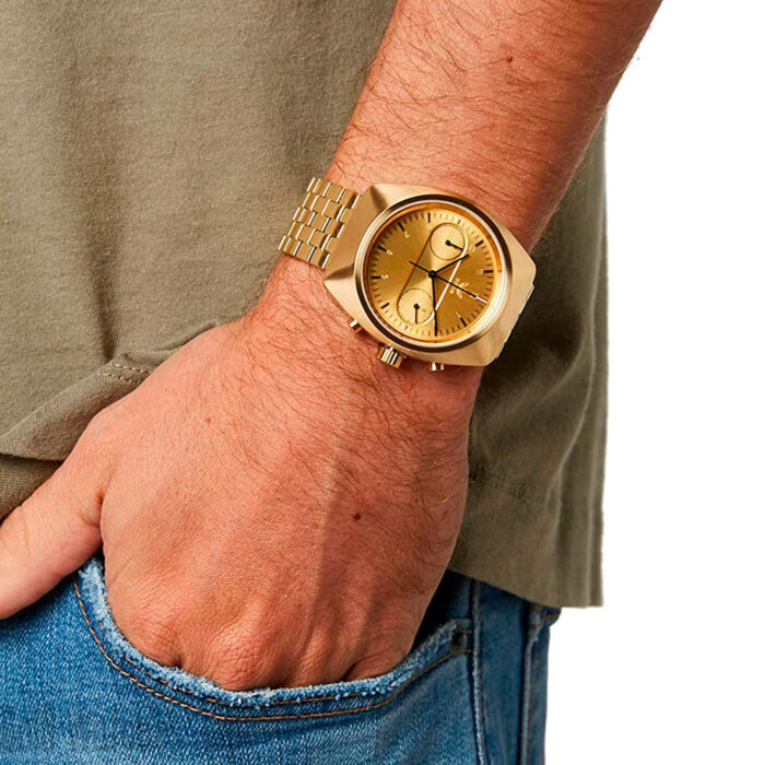 a men using a Adidas Z18502-00 golden watch for men